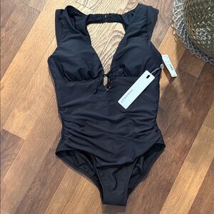 Dash Open Back Plunge One-Piece Swimsuit
Magicsuit®